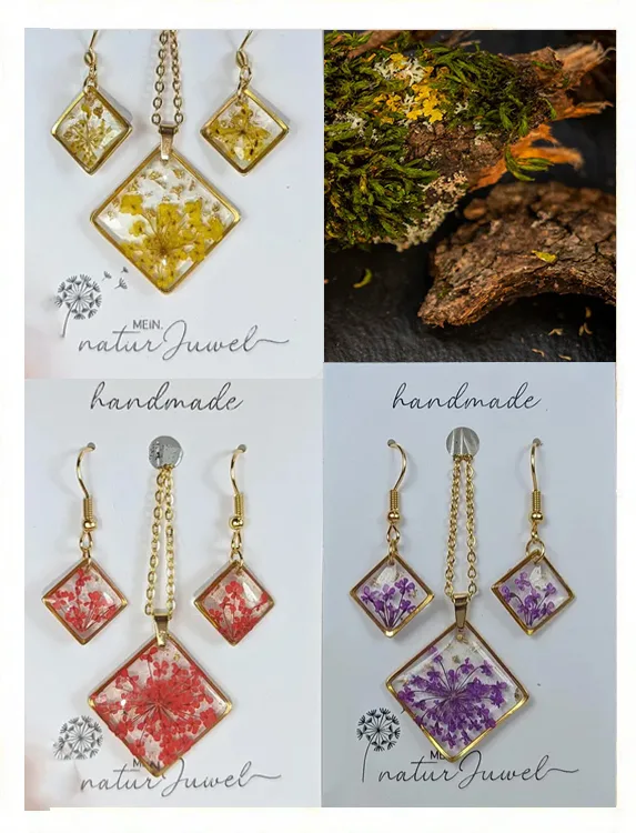 Handgemachter Schmuck mit echten Blüten – zarte Blüten in klarer Harzfassung, quadratische Form in Goldoptik, handgefertigt von MeinNaturJuwel
