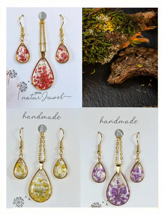 Handgemachter Schmuck mit echten Blüten in Tropfenform – feine Blüten in Harz gegossen, goldene Fassung, handgefertigt von MeinNaturJuwel